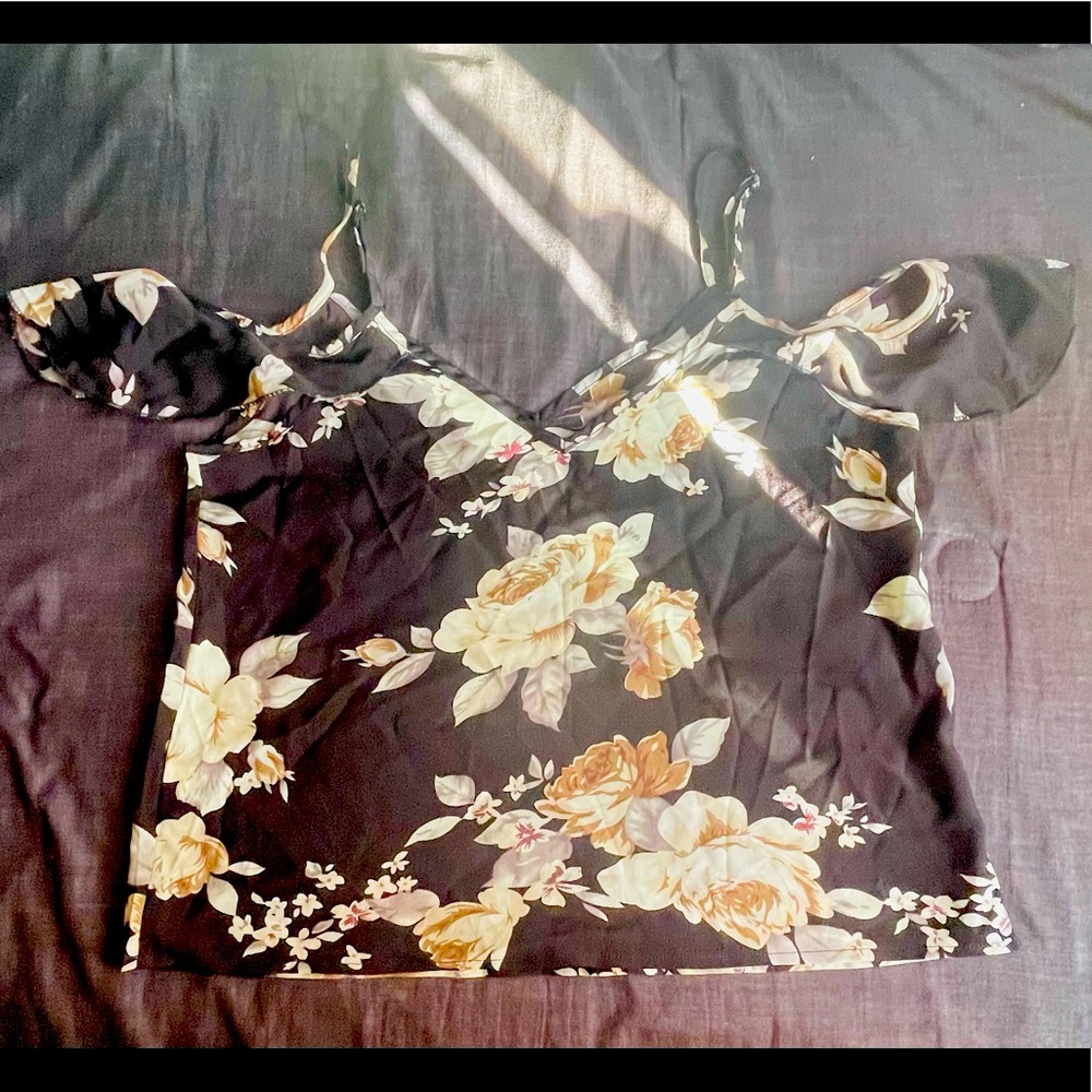 Floral off the shoulder with straps shirt.